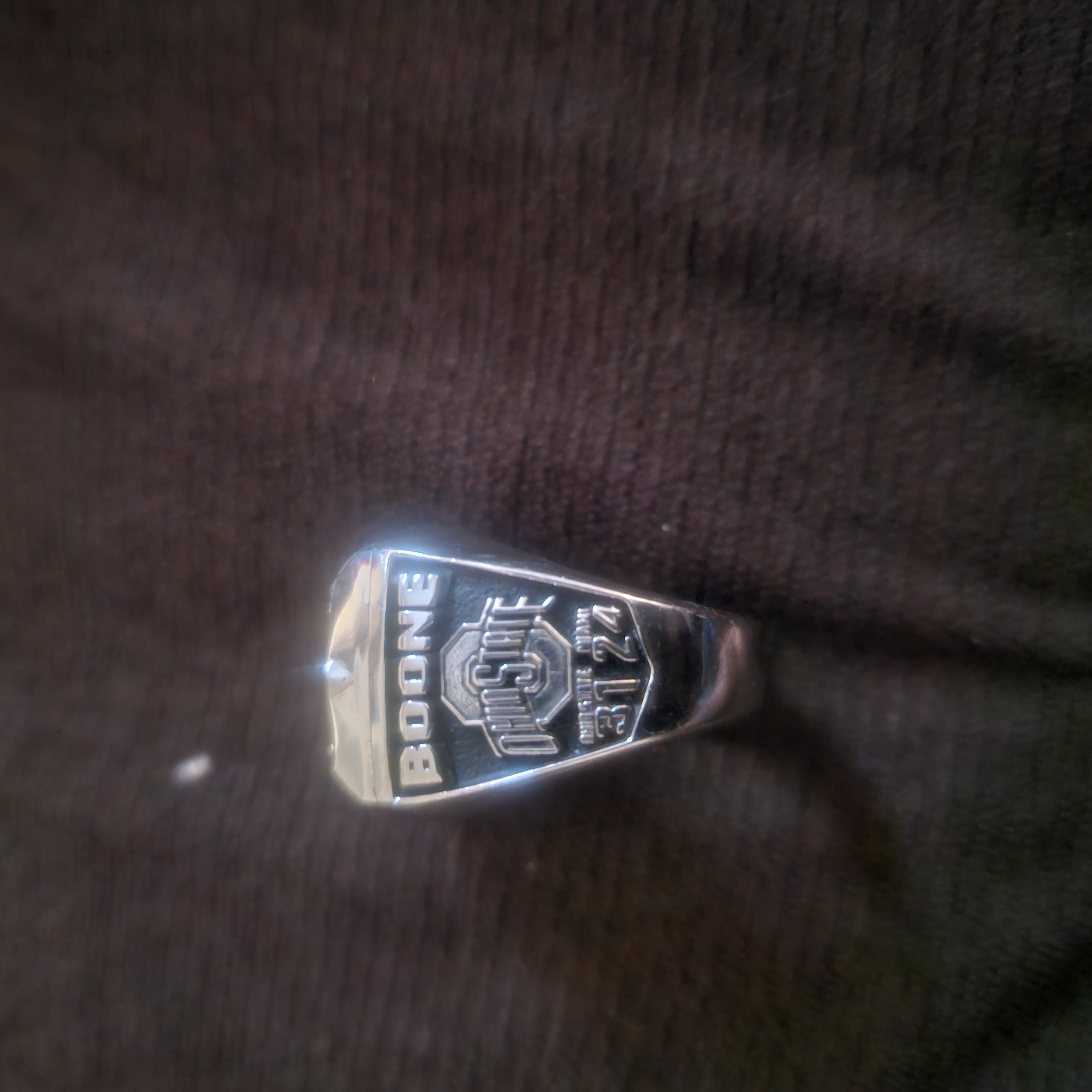 Championship ring engraved with Boone, Ohio State, and the 2002 title game score